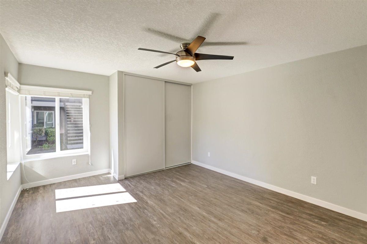 The James bedroom with fan and window area