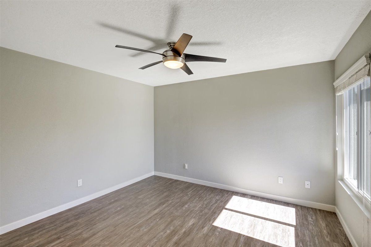 The James bed room area with fan