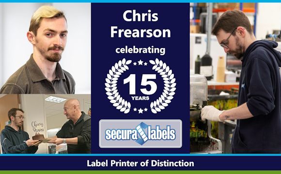 Celebrating Chris Frearson's 15 Years Service Collage celebrating Chris Frearson’s 15 years’ service at Secura Labels. The centre panel features text: 'Chris Frearson celebrating 15 years' with a laurel wreath design in white and the Secura Labels logo below that. The top left image is a professional portrait of Chris wearing a grey polo shirt, whilst the bottom left image shows Chris being presented with a cake (with a topper saying ‘Cheers to 15 Years’) and an envelope by the Managing Director, whilst the right hand image shows Chris hard at work, adjusting something on the press. The banner at the bottom reads: 'Label Printer of Distinction'.