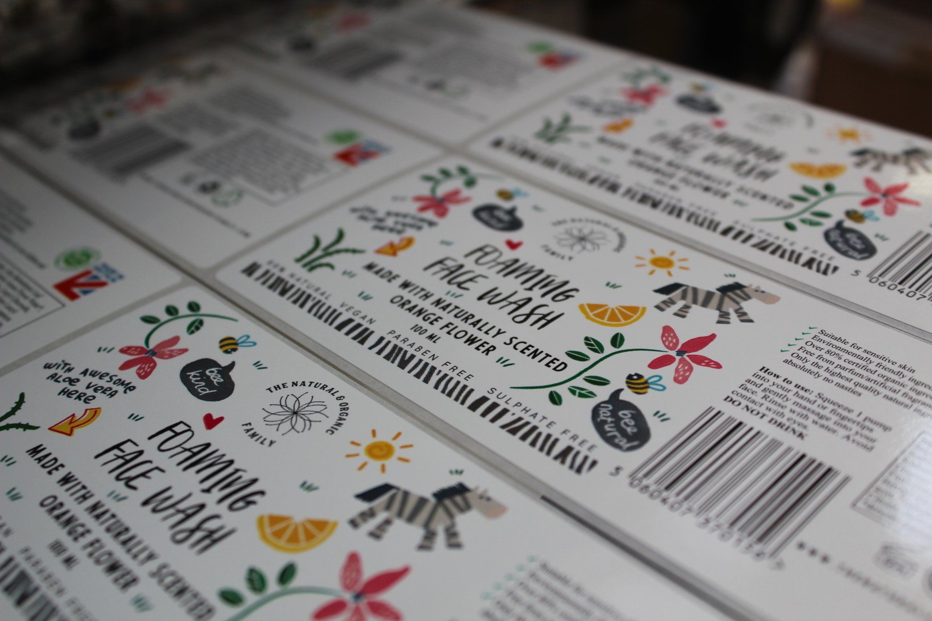 Reels of Foaming Face Wash labels being printed on the press