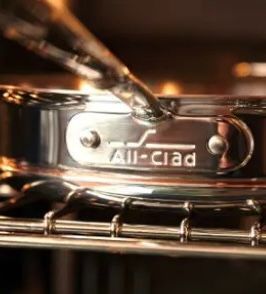 all clad copper core saute pan inside an oven
