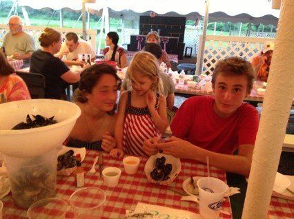 Family Eating Clams - in Middletown, Rhode Island