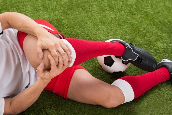 A soccer player suffering from knee injury