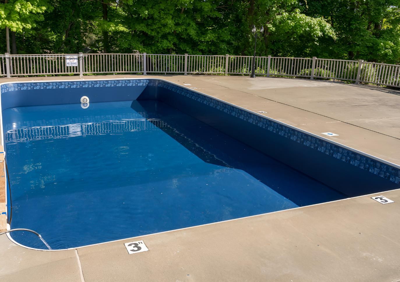 Large Swimming Pool With a Fence Around It — Precious Drop Water in Mullumbimby, NSW