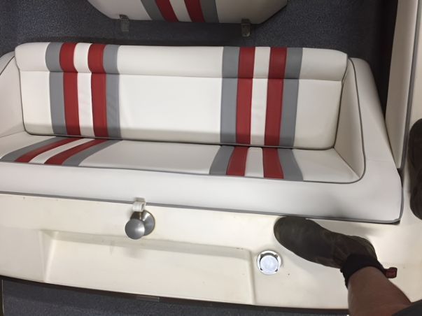 Boat Seating With Red And Grey Striped Upholstery — Western Tarps and Motor Trimming In Dubbo, NSW