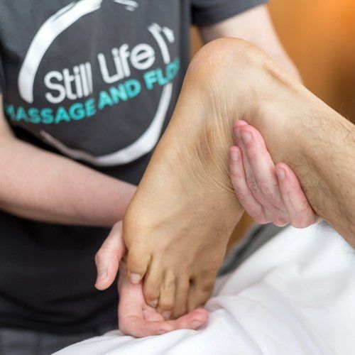 Photo of a person receiving a neuromuscular massage