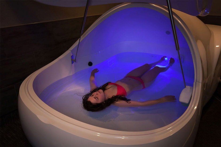 Photo of a comfortable woman in an infrared sauna