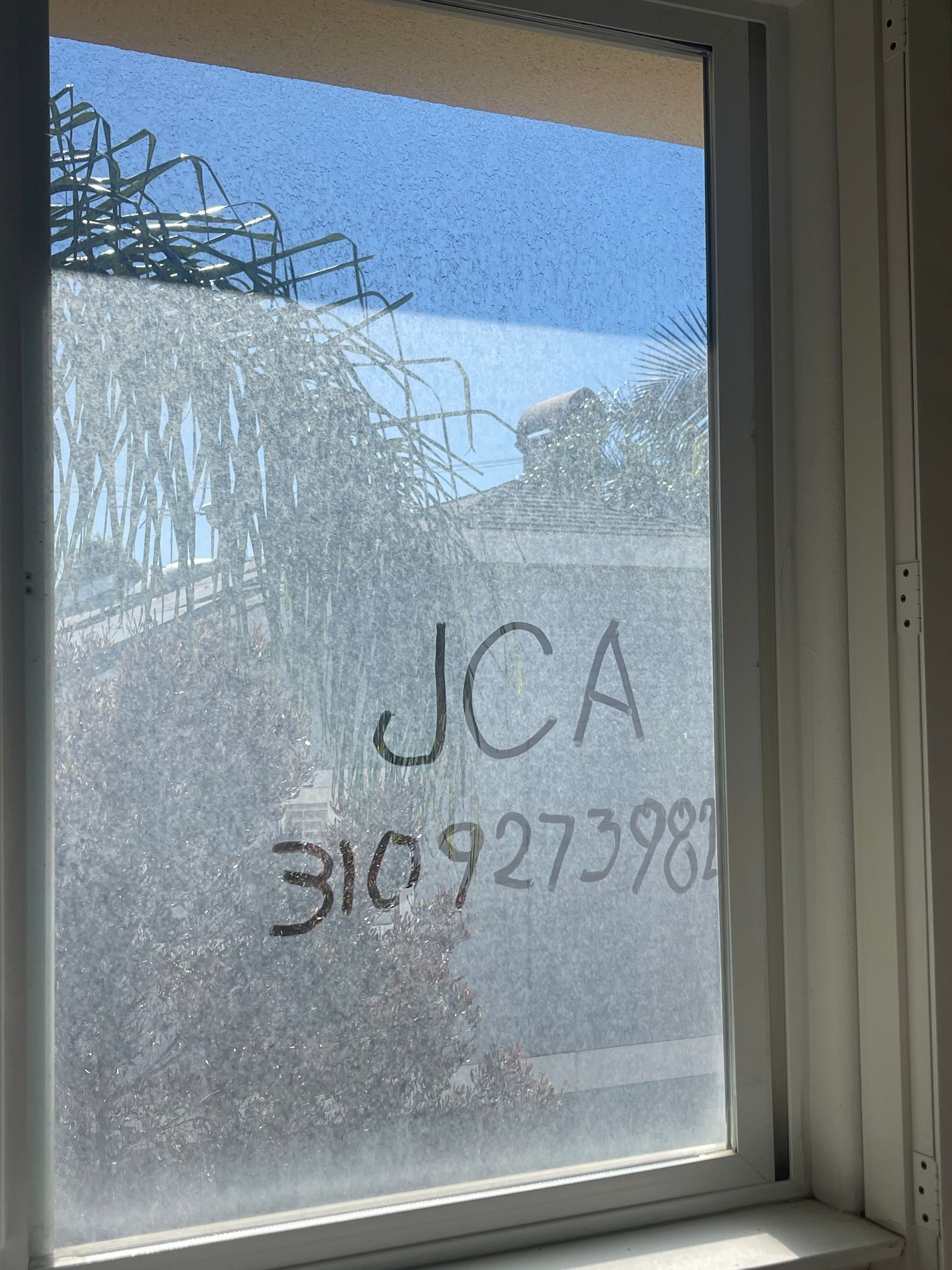 a window with the word jca written on it