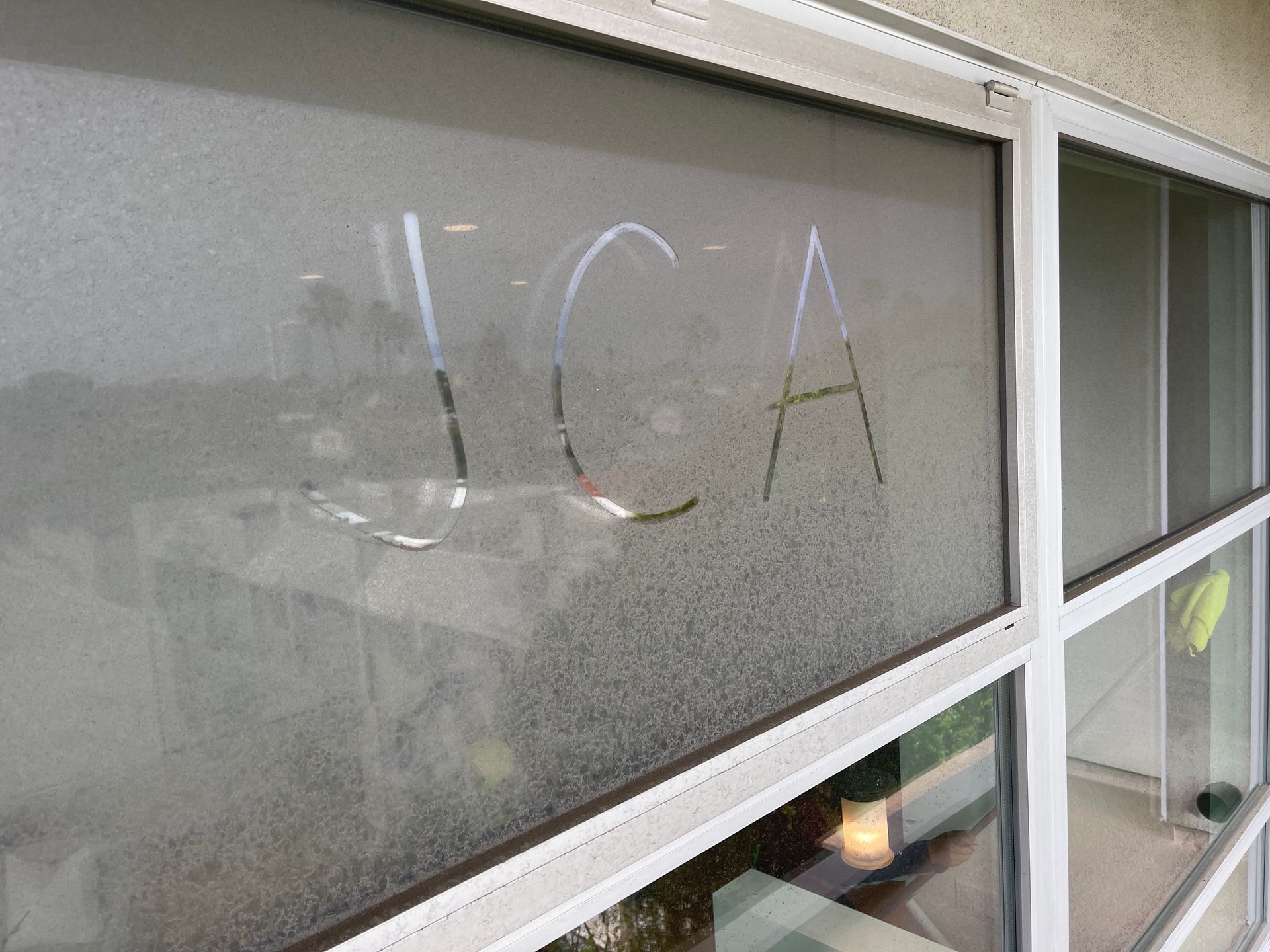a window with the word jca written on it