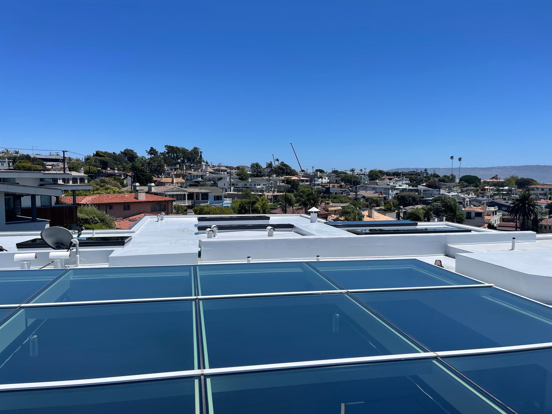 a view of a city from the roof of a building