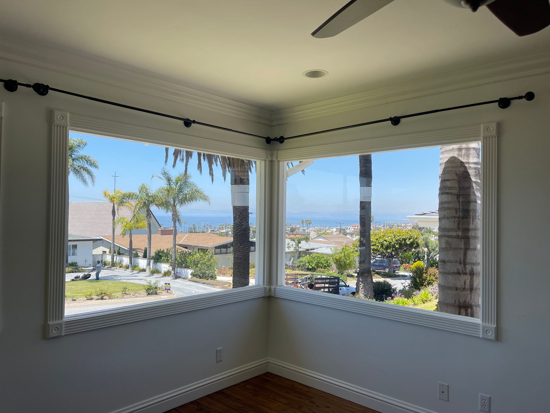 a room with a view of the ocean through a window