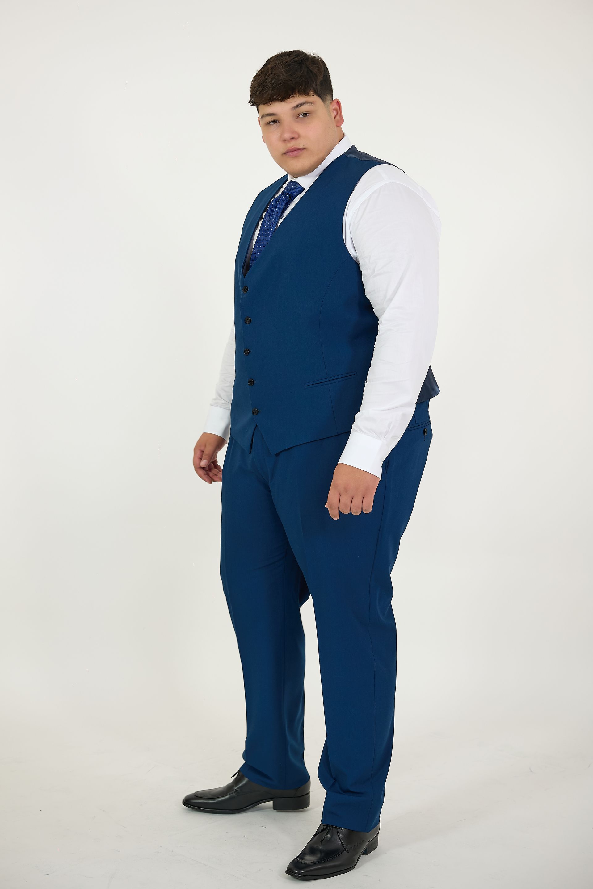 abiti cerimonia per taglie forti uomo