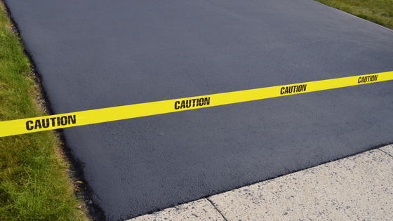 a new asphalt driveway in Houston Tx