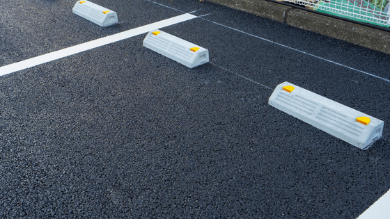 an asphalt parking lot in Houston Tx