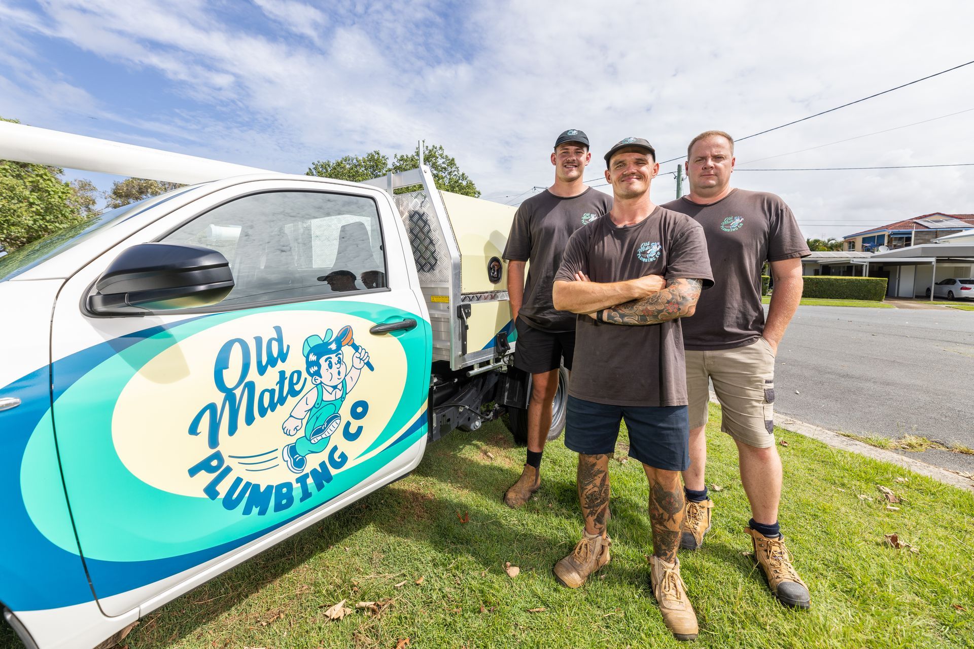 3 Mans Standing Next To Work Ute— Old Mate Plumbing Co in Hollywell, QLD