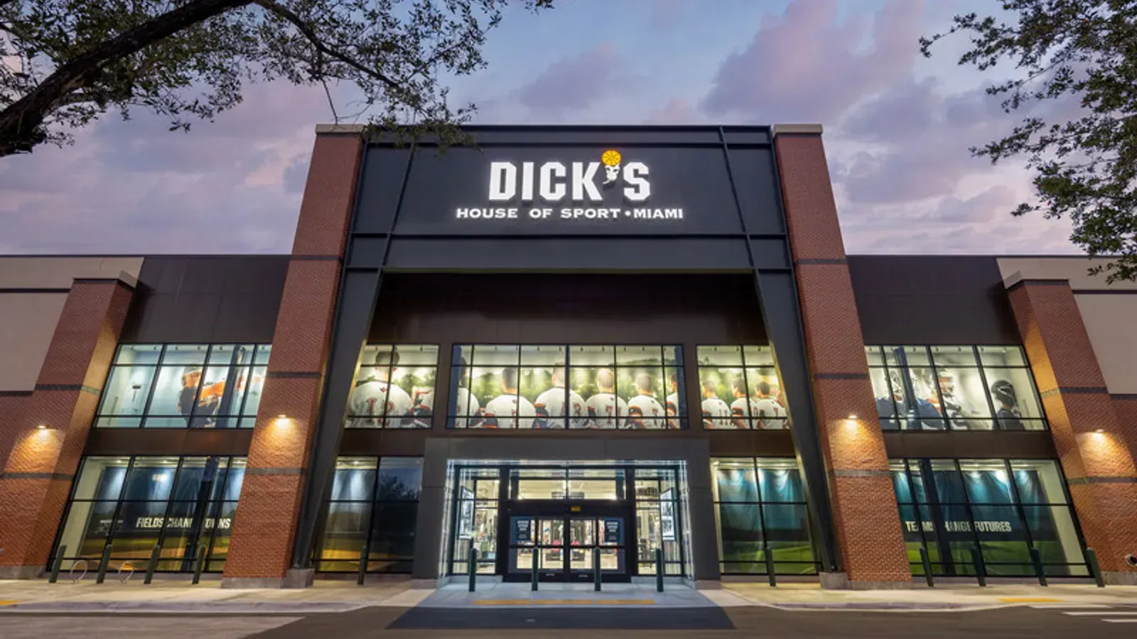The front of an aldi store with a sign in front of it.