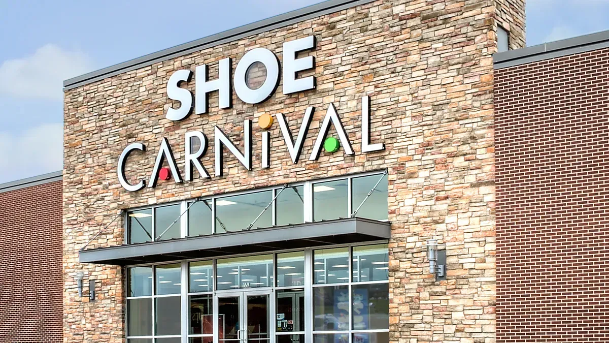 A shoe carnival store is located in a brick building.