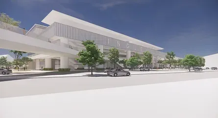 A computer generated image of a building with cars driving underneath it.