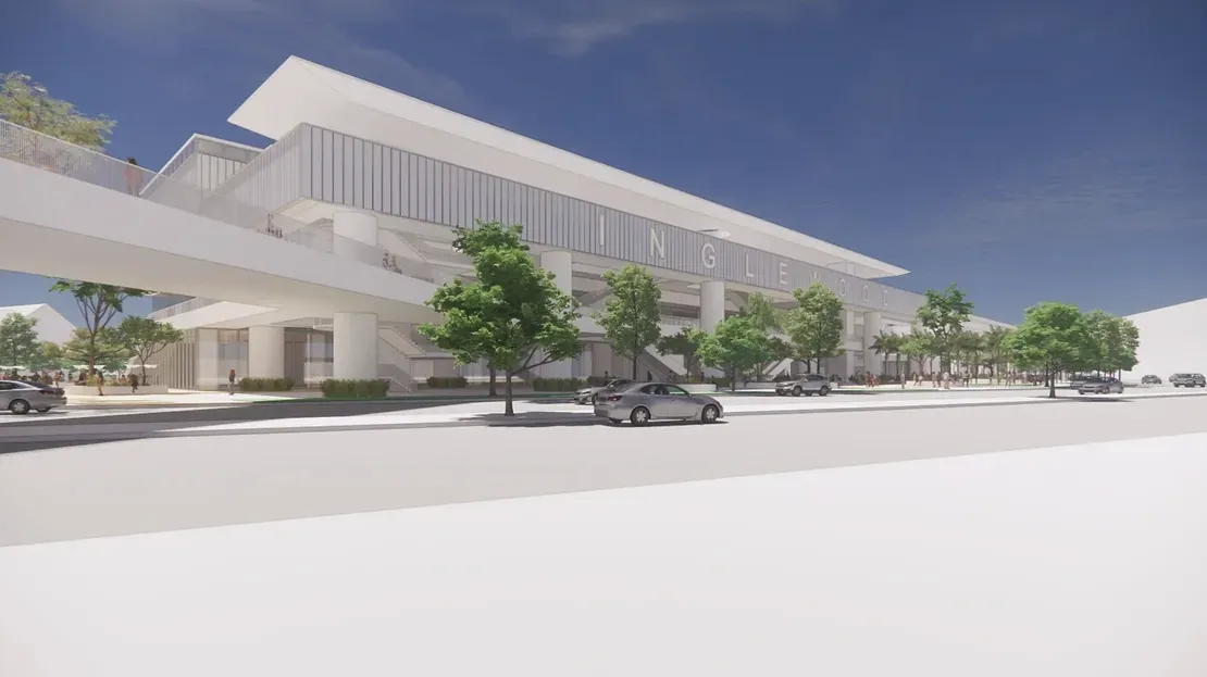 An artist 's impression of a large building with a bridge over it.
