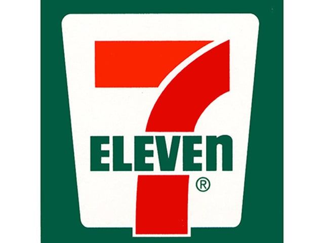 A 7 eleven logo on a green background