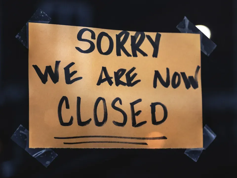 A sign that says sorry we are now closed
