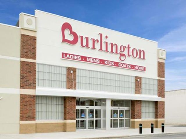 The front of a burlington store with a sign that says ladies mens kids coats home