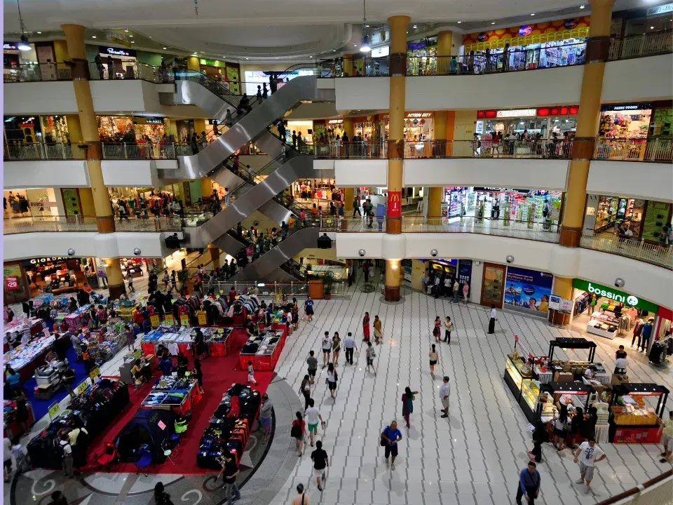 An aerial view of a shopping mall filled with people