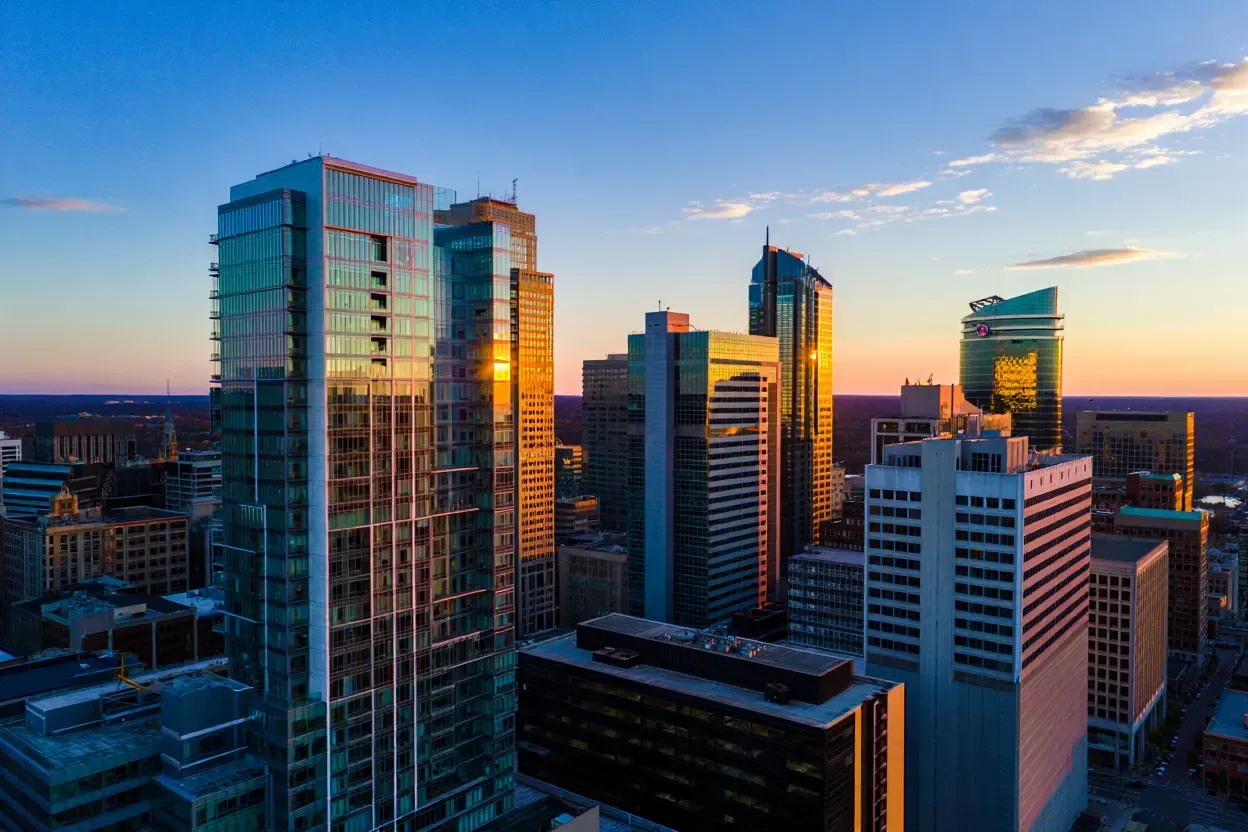 The front of an aldi store with a sign in front of it.