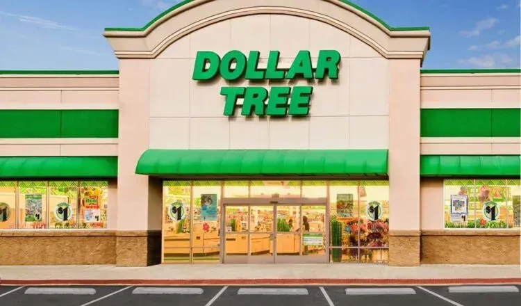 A dollar free store with a green awning