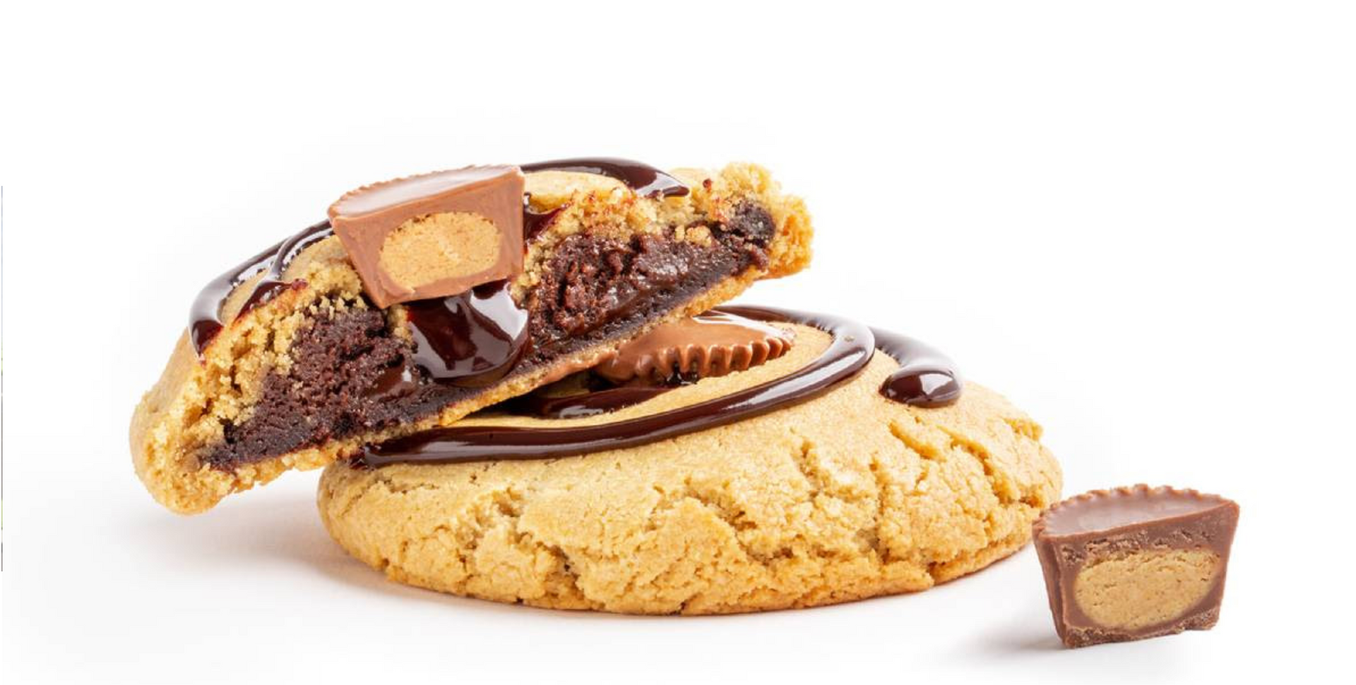 A peanut butter and chocolate cookie with a bite taken out of it.