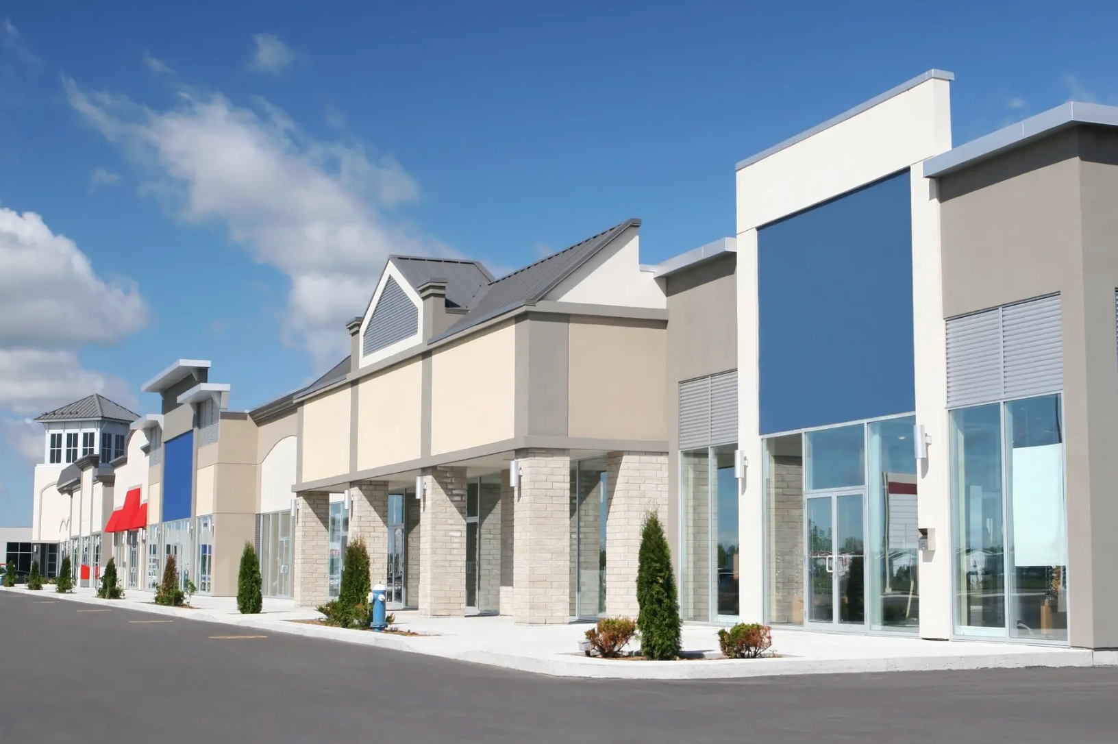 A car is parked in front of a sign that says 223