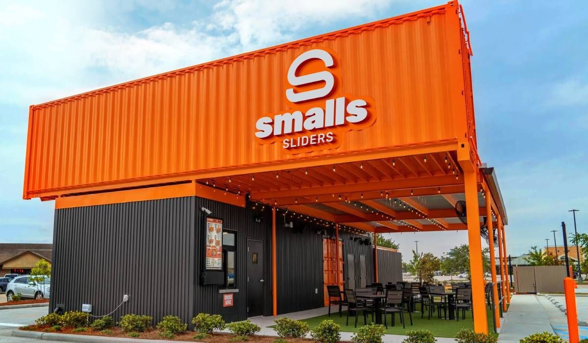 A smalls restaurant is built out of shipping containers.