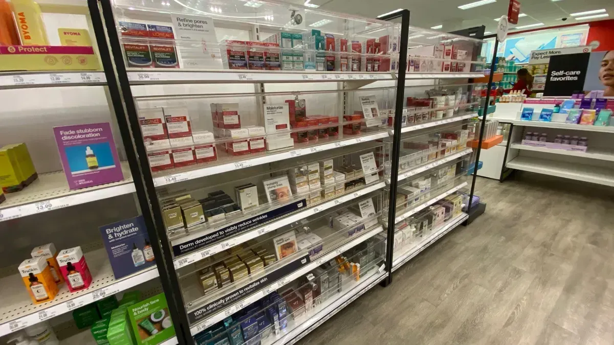 A row of empty shelves in a store.