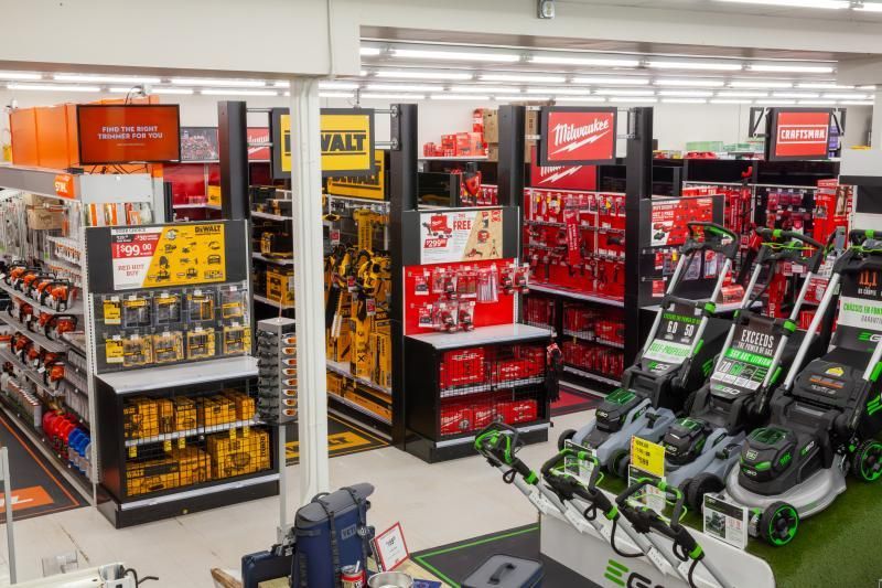 A store filled with lots of tools and lawn mowers.