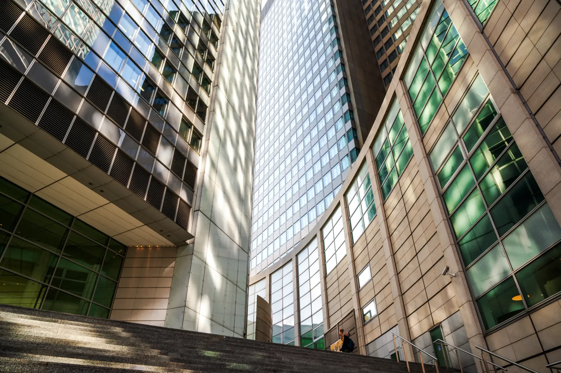 A car is parked in front of a sign that says 223