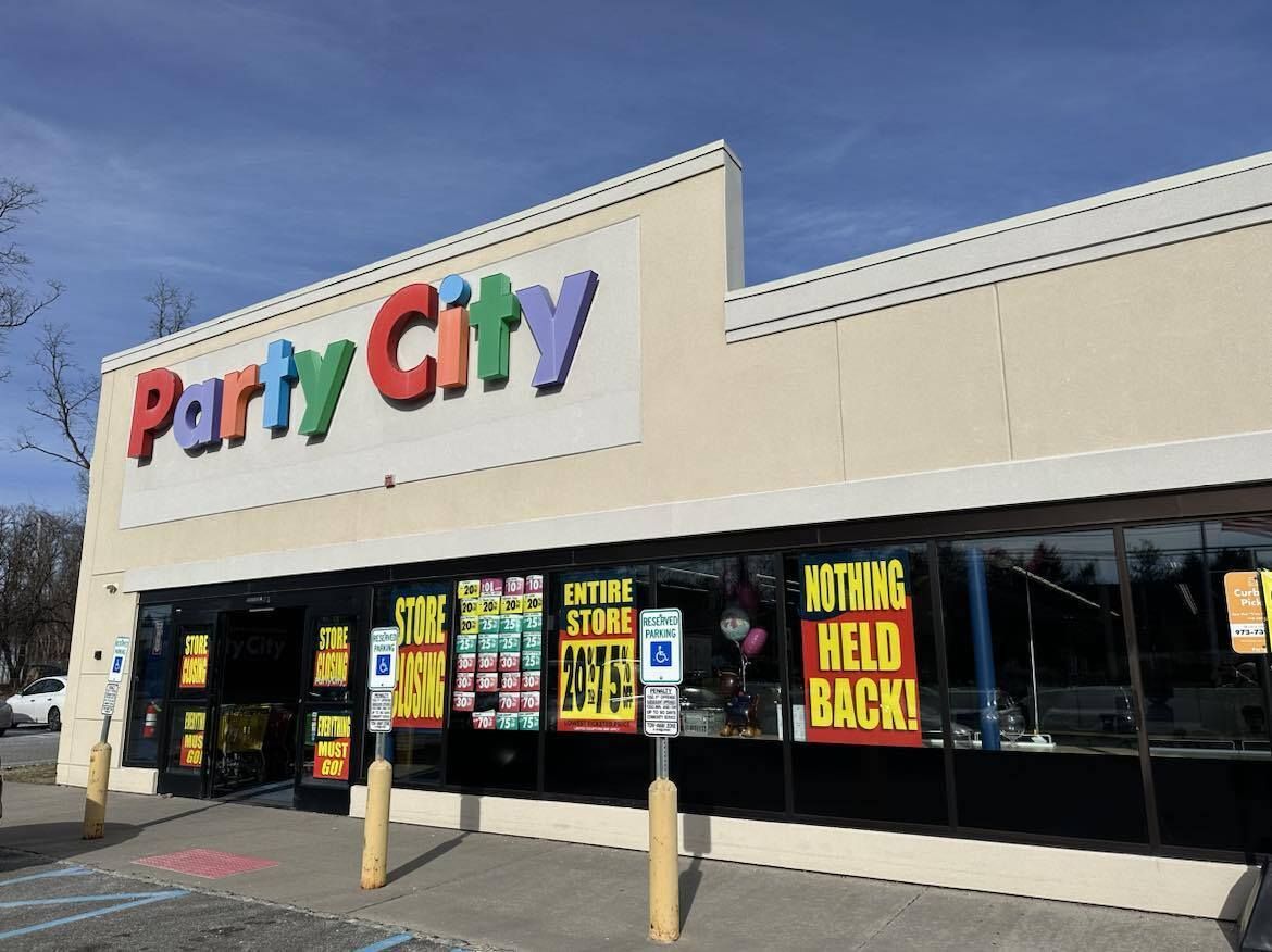 A party city store with a sign that says nothing weld back