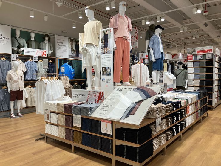 A store filled with lots of clothes and mannequins.
