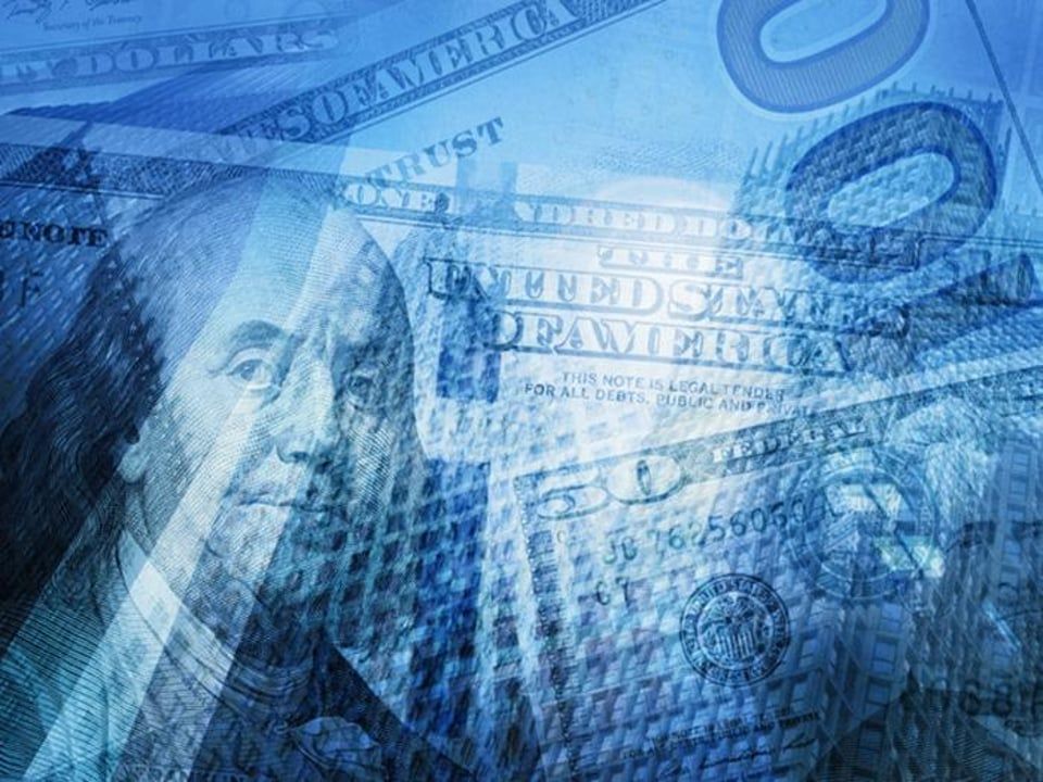 The front of an aldi store with a sign in front of it.