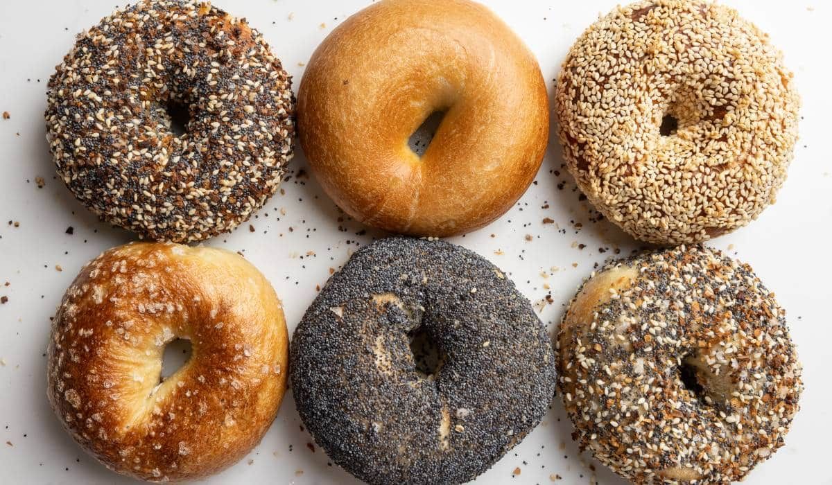 The front of an aldi store with a sign in front of it.