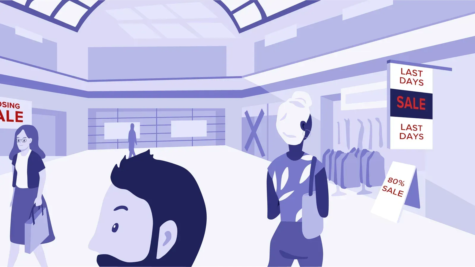 A man and a woman are standing in a shopping mall.