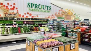 A grocery store filled with lots of fruits and vegetables.