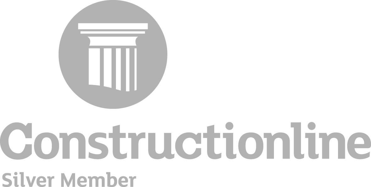 A construction online silver member logo with a pillar in a circle.
