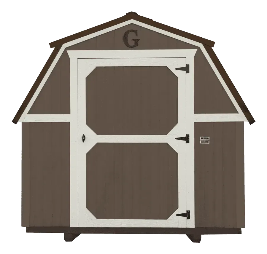 Brown barn shed with white trim and door, brown roof, and a 