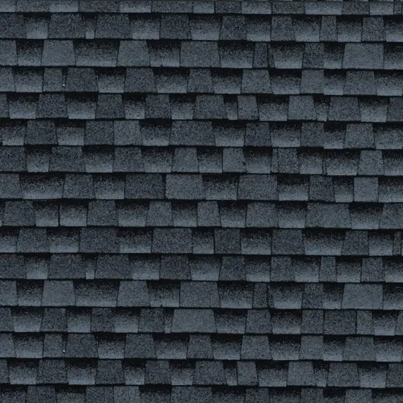 Dark blue asphalt shingle roof, textured with overlapping rectangular tiles.