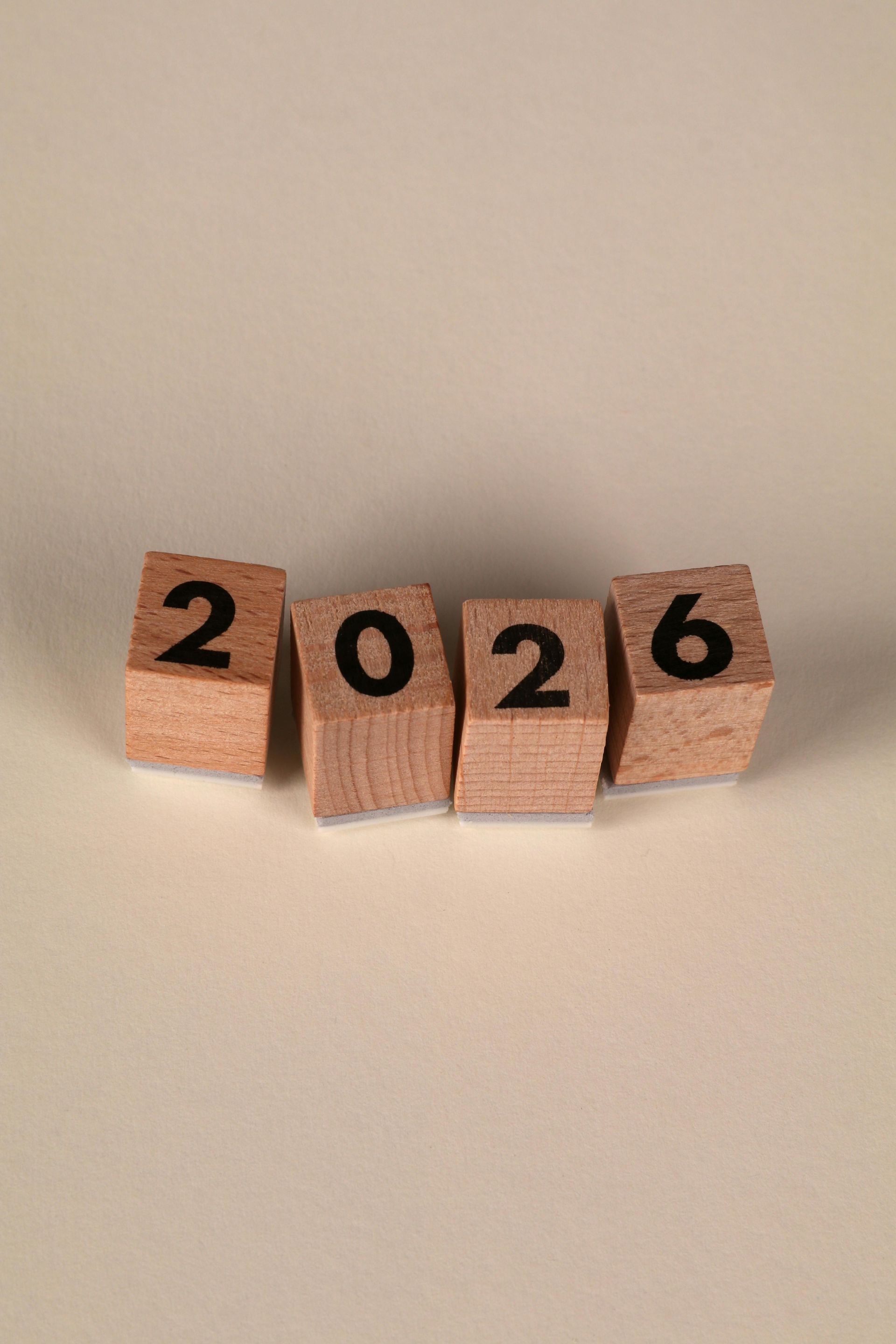 Wooden blocks spelling out the year 2026.