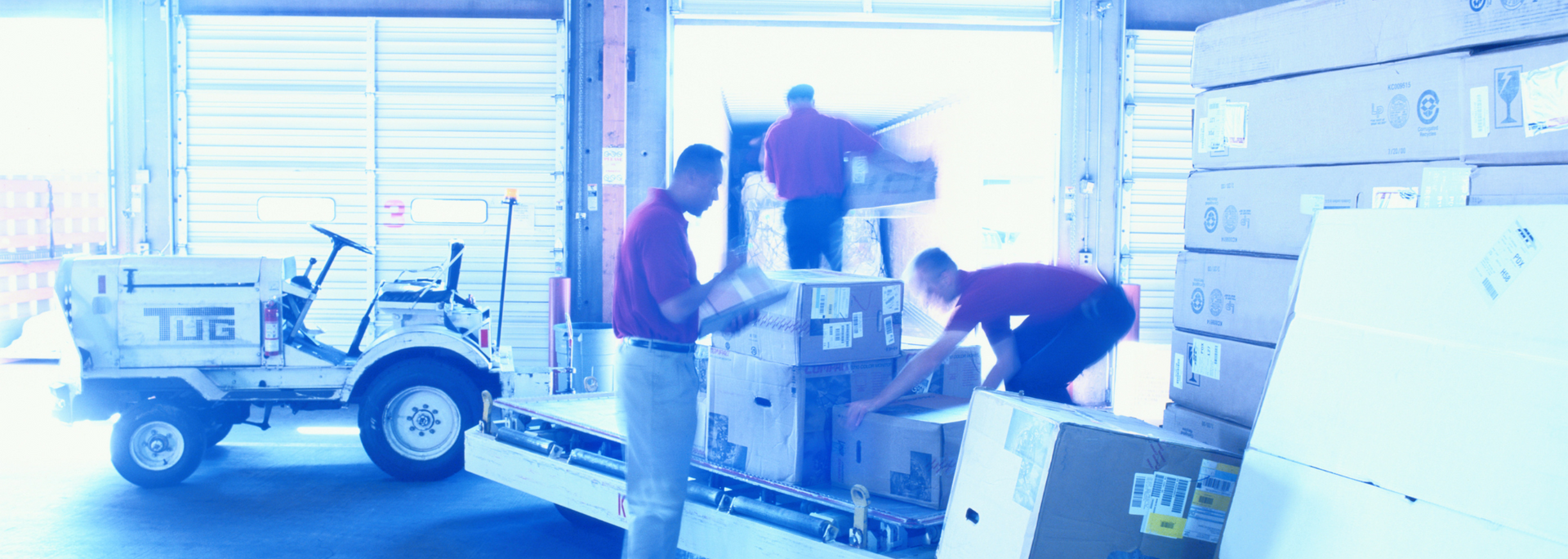 Picture of packages leaving a warehouse
