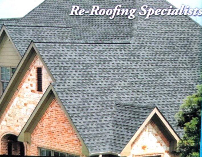 House with grey shingle roof; text 