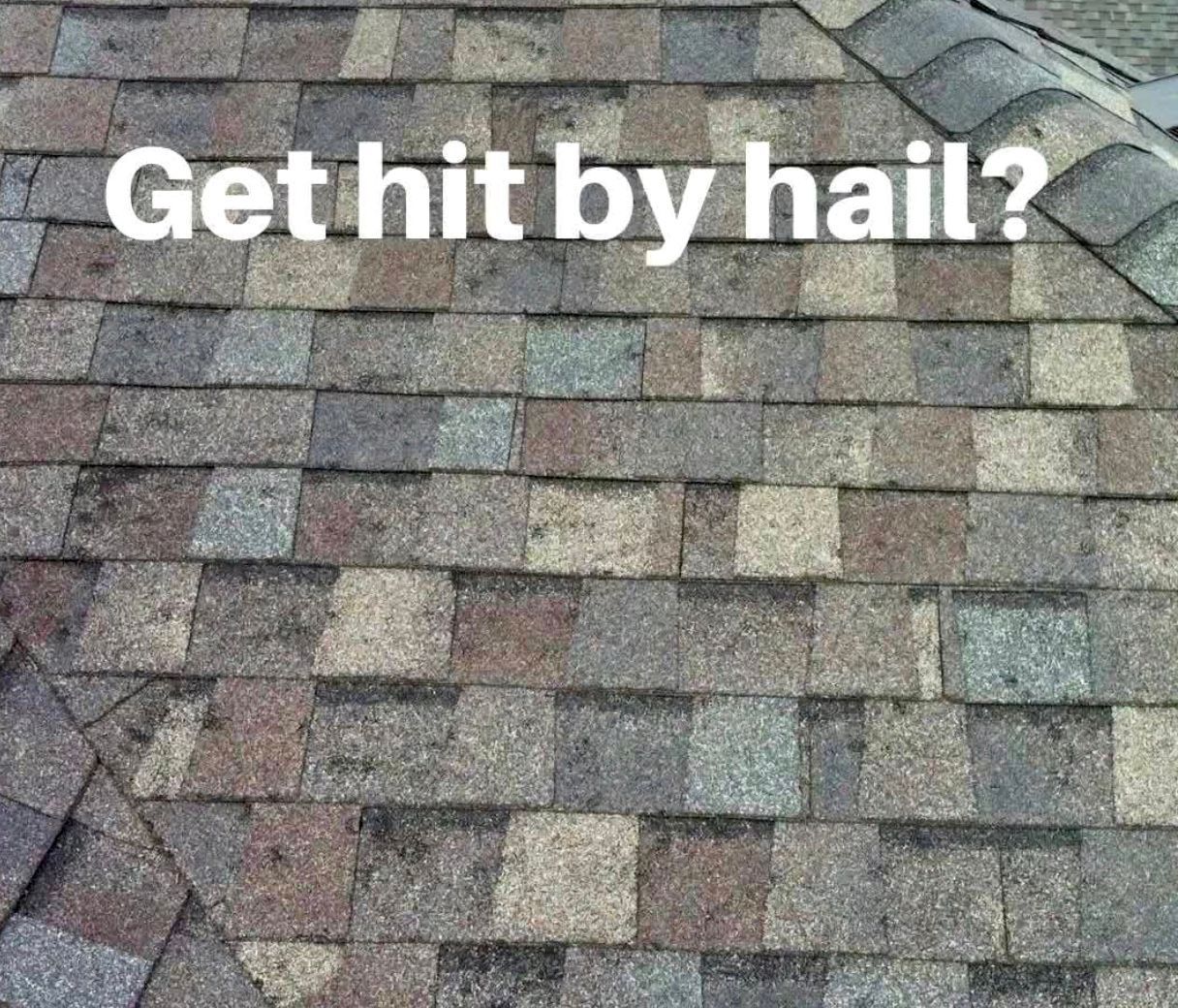 Close-up of a shingle roof with text 