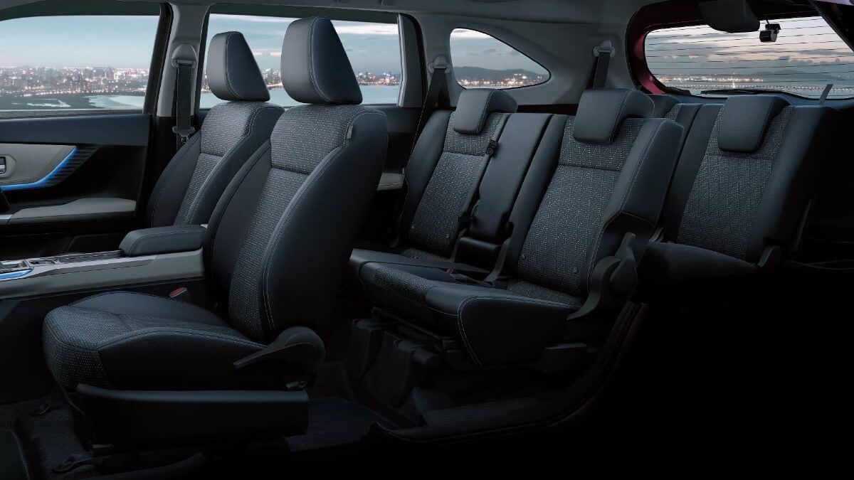 Toyota Veloz with 7 seats, dual air conditioning, and a sporty appearance, offering a versatile and comfortable ride in Palawan.