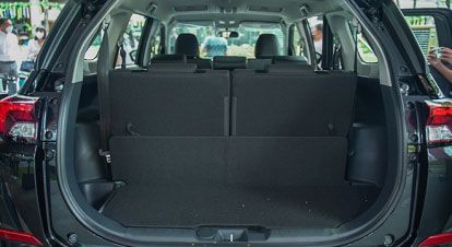 Toyota Veloz with a spacious trunk, similar to the Toyota Rush, ideal for accommodating 7 passengers who rent a car in Palawan, specifically in Puerto Princesa, Philippines.